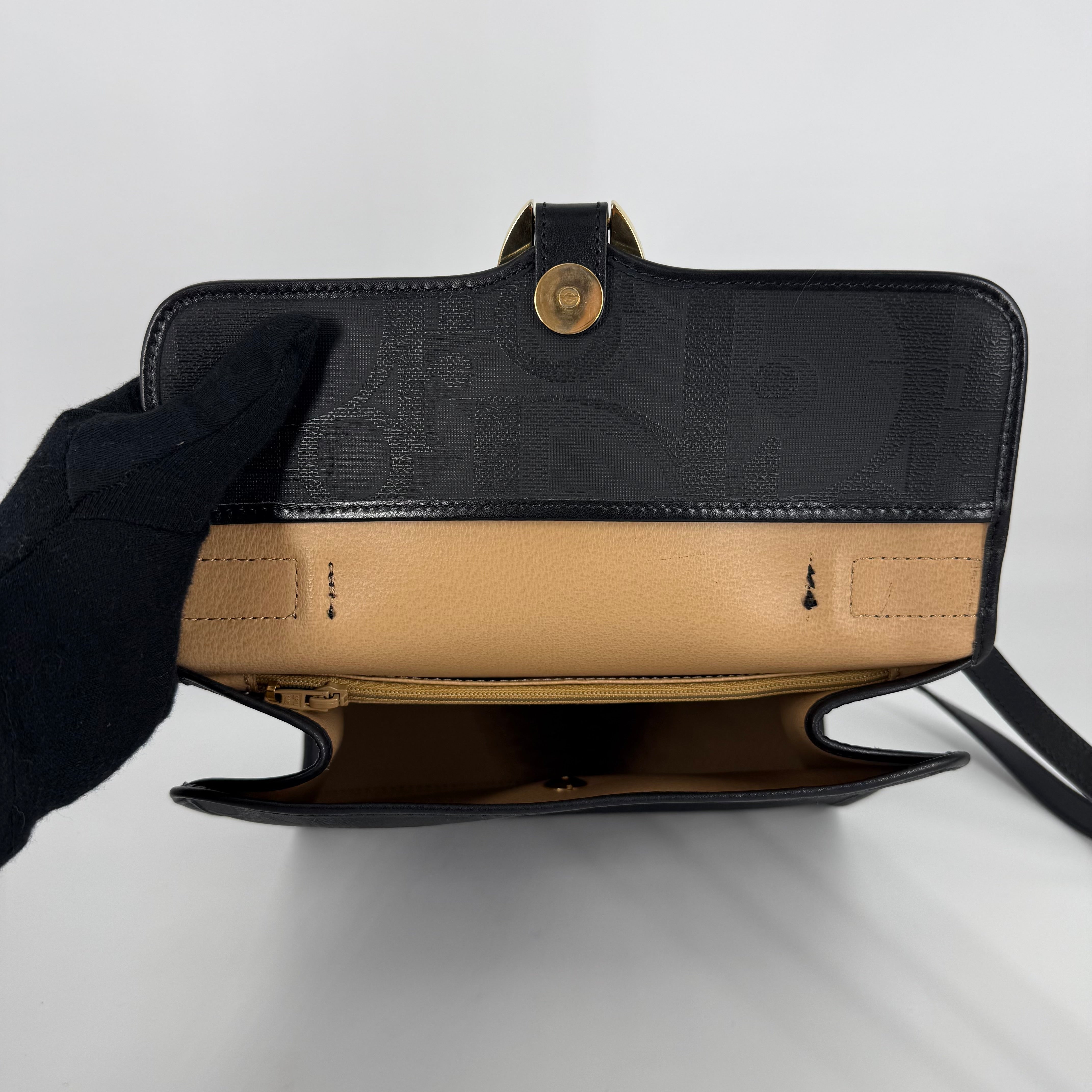 Black Oblique Trotter Shoulder Bag